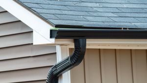 Installing Downspout on Gutter