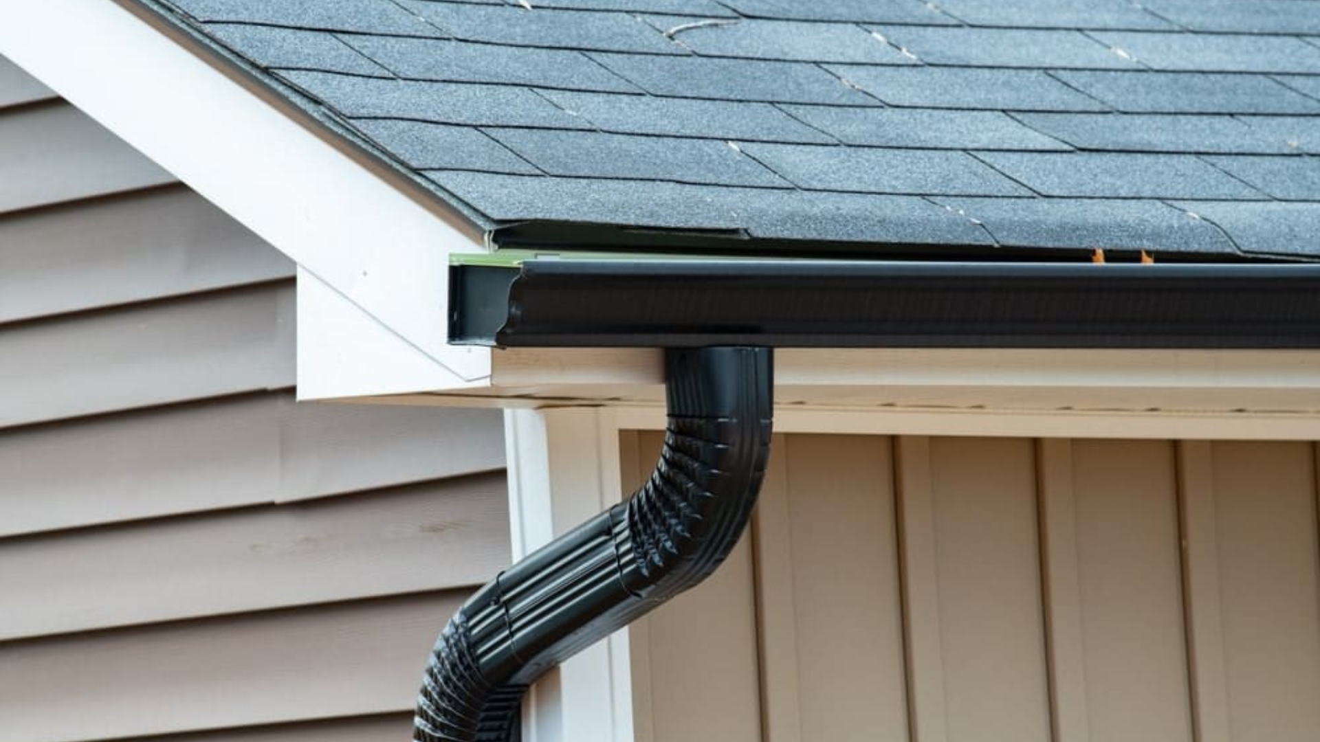 Installing Downspout on Gutter